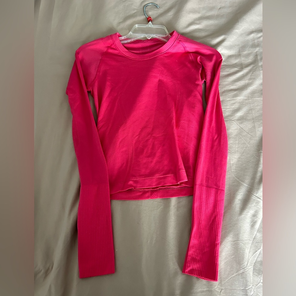 Pink lululemon workout shirt